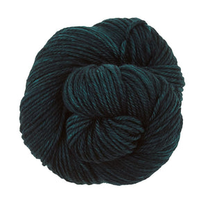 Skein of Madelinetosh TML Triple Twist Worsted weight yarn in color Snake (Green) for knitting and crocheting.