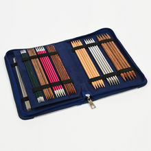 Load image into Gallery viewer, Knitter&#39;s Pride brand Blossom zippered, double pointed needle case. Perfectly sized to fit neatly in your bag or case, this compact needle case stores up to 16 sets of  double pointed needles (5 to a set). The suede like lining and secure elastic bands keep all in order.
