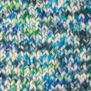 Skein of Berroco Coco Super Bulky weight yarn in the color Coast (Blue) for knitting and crocheting.