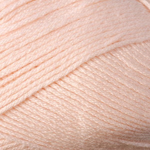 Skein of Berroco Comfort DK DK weight yarn in the color Peach (Orange) for knitting and crocheting.