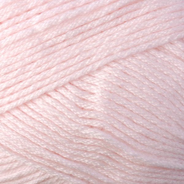 Skein of Berroco Comfort DK DK weight yarn in the color Pretty Pink (Pink) for knitting and crocheting.