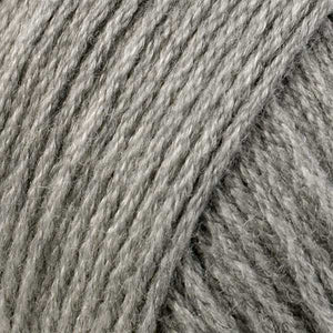 Skein of Berroco Comfort Worsted Worsted weight yarn in the color Ash Gray (Gray) for knitting and crocheting.