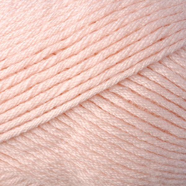 Skein of Berroco Comfort Worsted Worsted weight yarn in the color Peach (Orange) for knitting and crocheting.