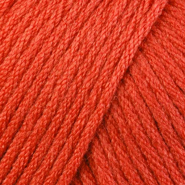 Skein of Berroco Comfort Worsted Worsted weight yarn in the color Persimmon (Orange) for knitting and crocheting.