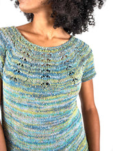 Load image into Gallery viewer, Woman modeling a sweater with a lace yoke knit in Berroco Summer Sesame Yarn, mint colorway.
