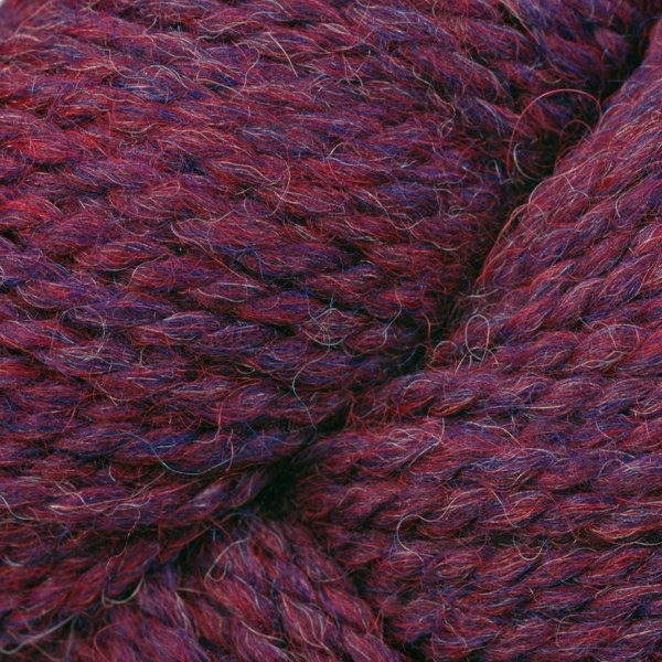 Skein of Berroco Ultra Alpaca Chunky Bulky weight yarn in the color Berry Pie Mix (Purple) for knitting and crocheting.