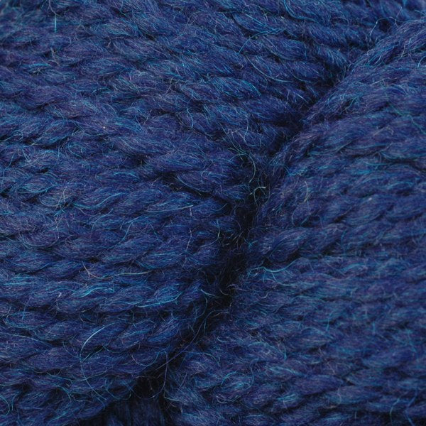 Skein of Berroco Ultra Alpaca Chunky Bulky weight yarn in the color Indigo Mix (Blue) for knitting and crocheting.
