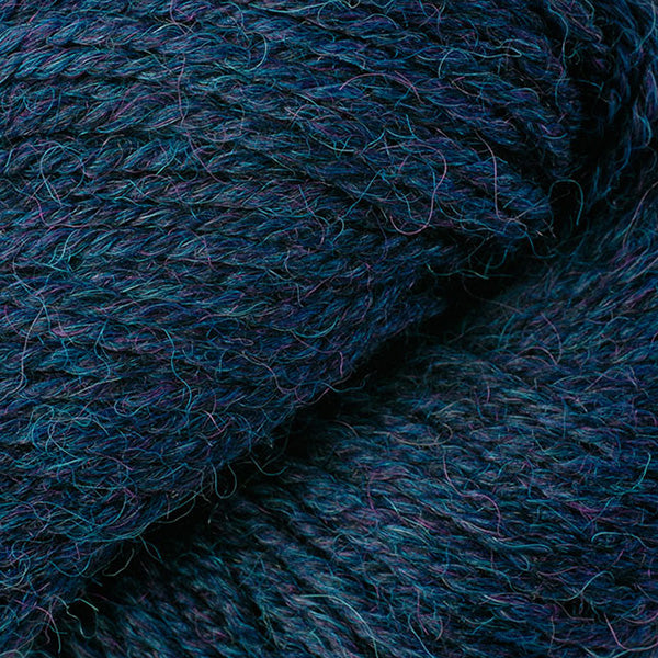 Skein of Berroco Ultra Alpaca Light DK weight yarn in the color Blueberry Mix (Blue) for knitting and crocheting.
