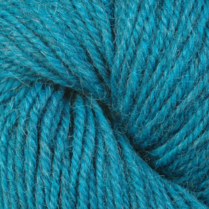 Skein of Berroco Ultra Alpaca Light DK weight yarn in the color Carribean Mix (Blue) for knitting and crocheting.