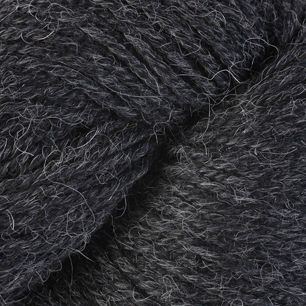 Skein of Berroco Ultra Alpaca Light DK weight yarn in the color Charcoal Mix (Gray) for knitting and crocheting.