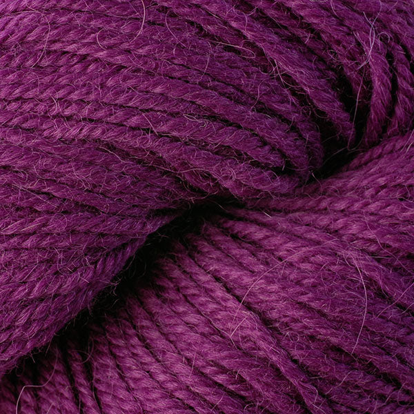 Skein of Berroco Ultra Alpaca Light DK weight yarn in the color Orchid (Pink) for knitting and crocheting.