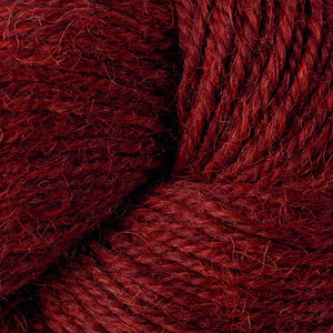 Skein of Berroco Ultra Alpaca Light DK weight yarn in the color Redwood Mix (Red) for knitting and crocheting.
