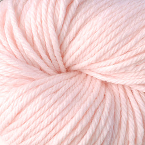Skein of Berroco Vintage Chunky Bulky weight yarn in the color Fondant (Pink) for knitting and crocheting.