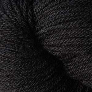 Skein of Berroco Vintage DK DK weight yarn in the color Cast Iron (Black) for knitting and crocheting.