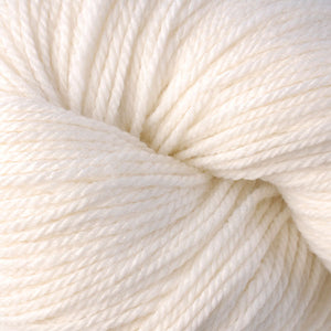 Skein of Berroco Vintage DK DK weight yarn in the color Mochi (White) for knitting and crocheting.