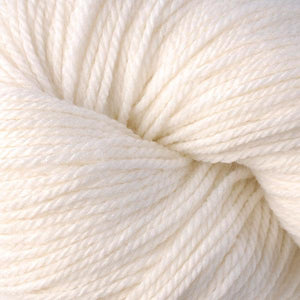 Skein of Berroco Vintage DK DK weight yarn in the color Mochi (White) for knitting and crocheting.
