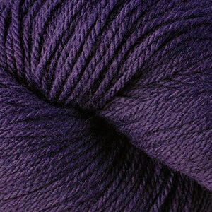 Skein of Berroco Vintage DK DK weight yarn in the color Petunia (Purple) for knitting and crocheting.