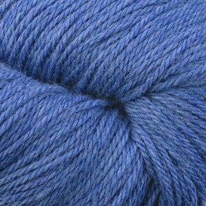 Skein of Berroco Vintage DK DK weight yarn in the color Sapphire (Blue) for knitting and crocheting.