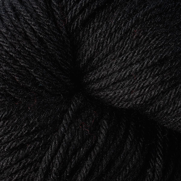 Skein of Berroco Vintage  Worsted weight yarn in the color Cast Iron (Black) for knitting and crocheting.