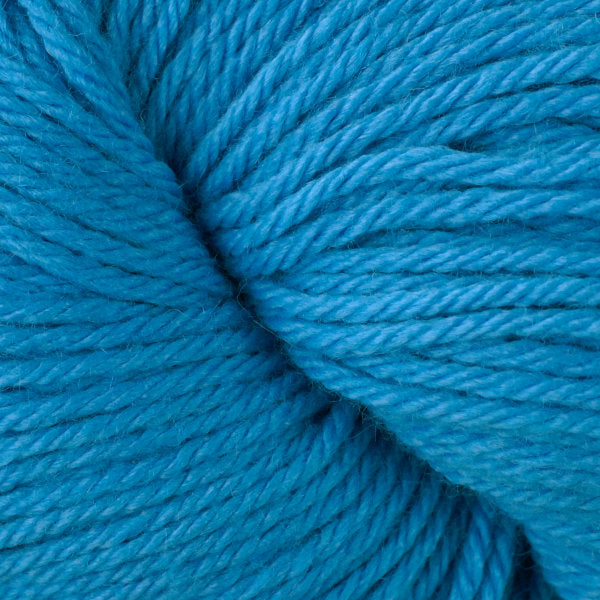 Skein of Berroco Vintage Worsted weight yarn in the color Horizon Blue (Blue) for knitting and crocheting.