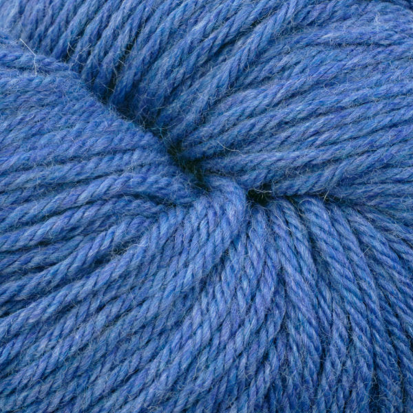 Skein of Berroco Vintage  Worsted weight yarn in the color Sapphire (Blue) for knitting and crocheting.