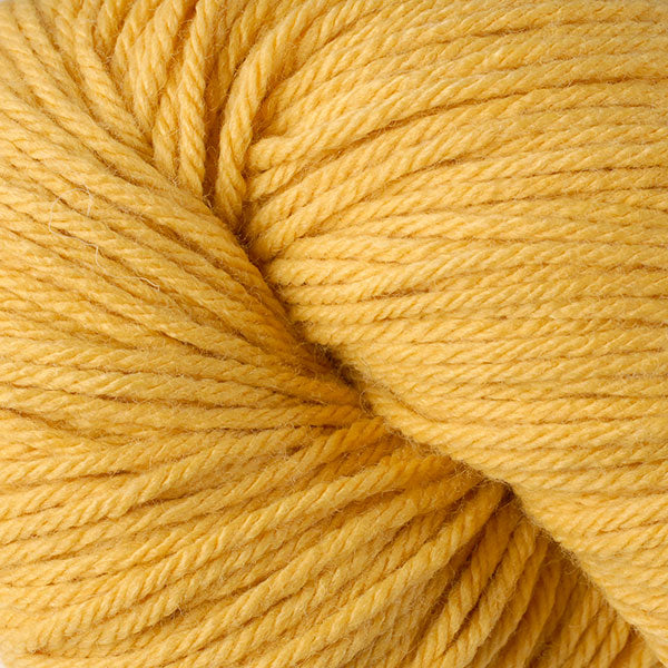 Skein of Berroco Vintage Worsted weight yarn in the color Sunny (Yellow) for knitting and crocheting.