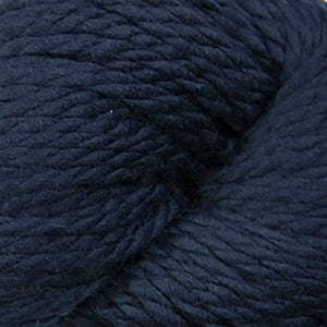 Skein of Cascade 128 Superwash Bulky weight yarn in the color Navy (Blue) for knitting and crocheting.