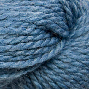 Skein of Cascade 128 Superwash Bulky weight yarn in the color Sapphire (Blue) for knitting and crocheting.