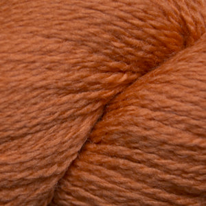 Skein of Cascade 220 Fingering Sock weight yarn in the color Amber Glow (Orange) for knitting and crocheting.