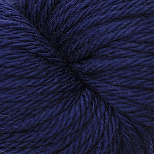 Skein of Cascade 220 Superwash Sport Sport weight yarn in the color Blue Depths (Blue) for knitting and crocheting.