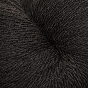 Skein of Cascade 220 Superwash Sport Sport weight yarn in the color Chocolate (Brown) for knitting and crocheting.