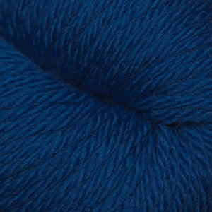 Skein of Cascade 220 Superwash Sport Sport weight yarn in the color Classic Blue (Blue) for knitting and crocheting.