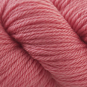 Skein of Cascade 220 Superwash Sport Sport weight yarn in the color Georgia Peach (Pink) for knitting and crocheting.
