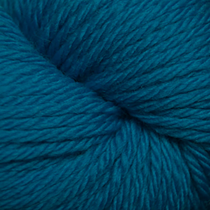 Skein of Cascade 220 Superwash Sport Sport weight yarn in the color Methyl Blue (Blue) for knitting and crocheting.