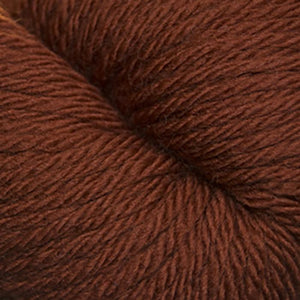 Skein of Cascade 220 Superwash Sport Sport weight yarn in the color Picante (Orange) for knitting and crocheting.