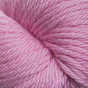 Skein of Cascade 220 Superwash Sport Sport weight yarn in the color Pink Ice (Pink) for knitting and crocheting.