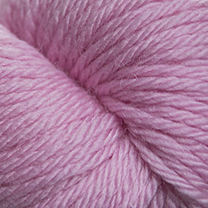 Skein of Cascade 220 Superwash Sport Sport weight yarn in the color Pink Ice (Pink) for knitting and crocheting.