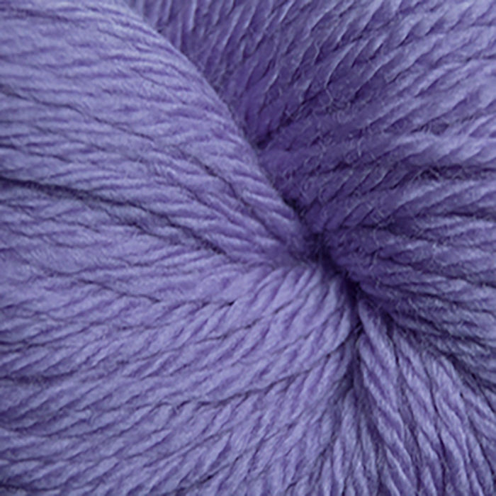 Skein of Cascade 220 Superwash Sport Sport weight yarn in the color Wisteria (Purple) for knitting and crocheting.