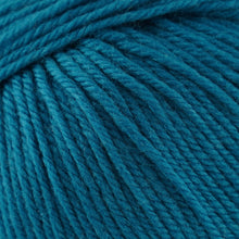 Load image into Gallery viewer, Skein of Cascade 220 Superwash Worsted weight yarn in the color Blue Sapphire (Blue) for knitting and crocheting.
