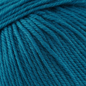 Skein of Cascade 220 Superwash Worsted weight yarn in the color Blue Sapphire (Blue) for knitting and crocheting.