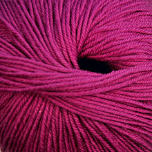 Load image into Gallery viewer, Skein of Cascade 220 Superwash Worsted weight yarn in the color Raspberry (Pink) for knitting and crocheting.
