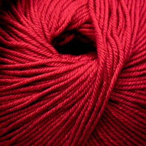 Skein of Cascade 220 Superwash Worsted weight yarn in the color Really Red (Red) for knitting and crocheting.