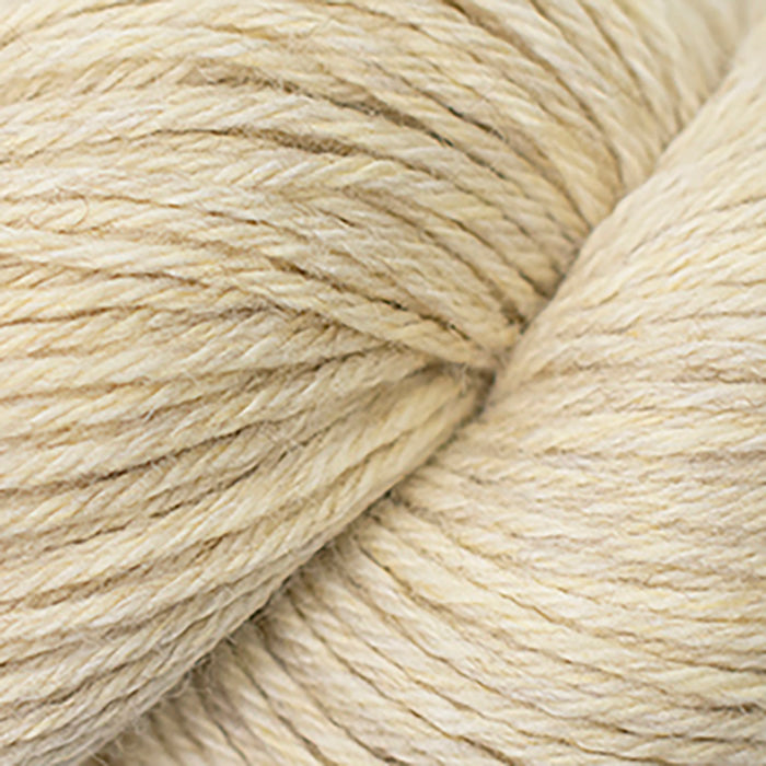 Skein of Cascade 220 Worsted weight yarn in the color Antiqued Heather (Tan) for knitting and crocheting.