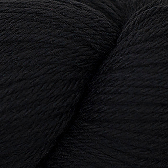 Skein of Cascade 220 Worsted weight yarn in the color Black (Black) for knitting and crocheting.