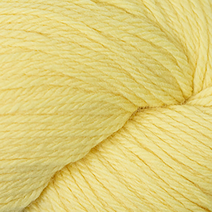 Skein of Cascade 220 Worsted weight yarn in the color Butter (Yellow) for knitting and crocheting.