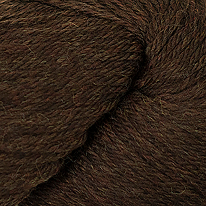 Skein of Cascade 220 Worsted weight yarn in the color Chocolate Heather (Brown) for knitting and crocheting.
