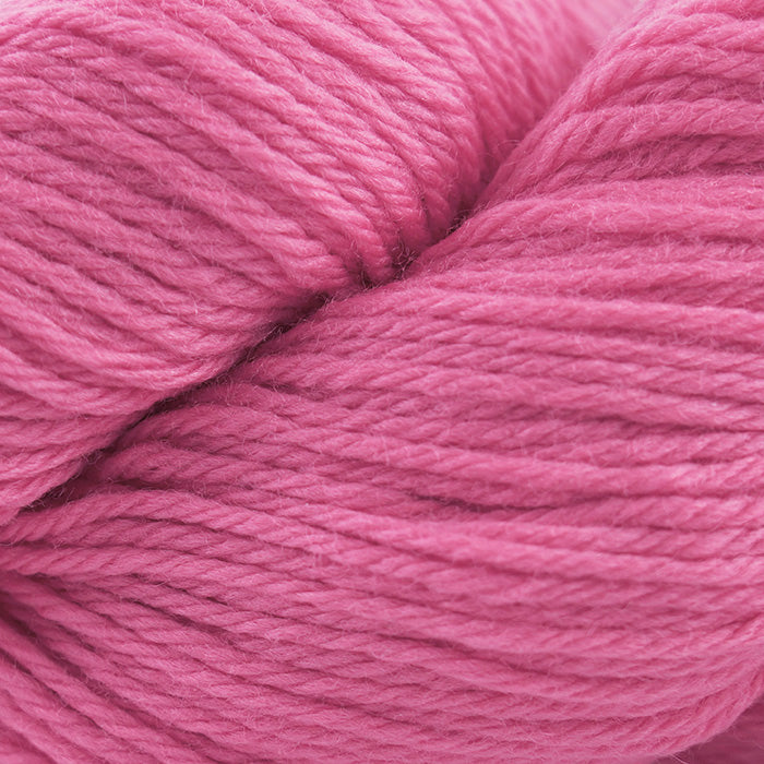 Skein of Cascade 220 Worsted weight yarn in the color Cotton Candy (Pink) for knitting and crocheting.