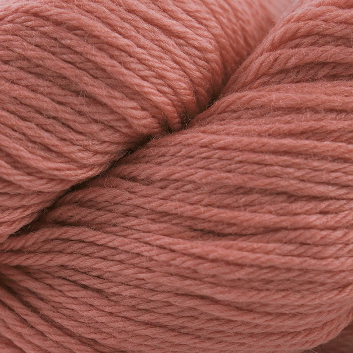 Skein of Cascade 220 Worsted weight yarn in the color Crabapple (Red) for knitting and crocheting.