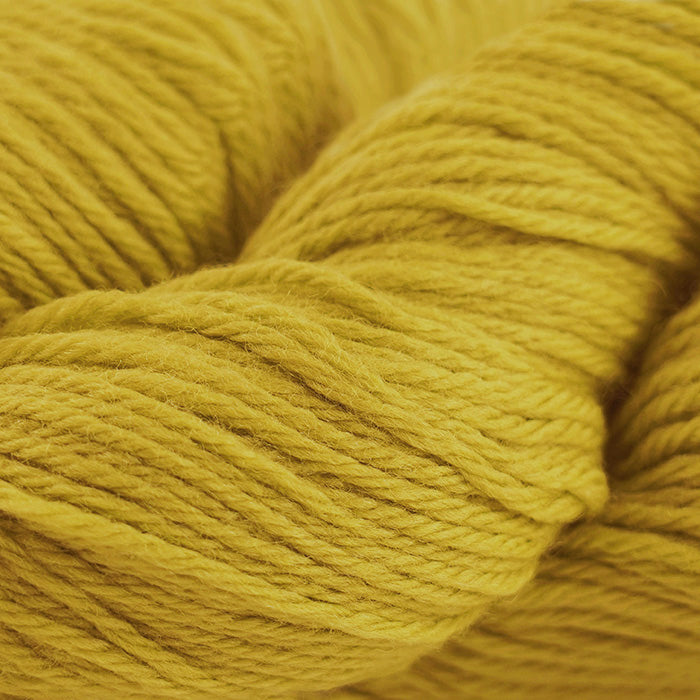Skein of Cascade 220 Worsted weight yarn in the color Goldenrod (Yellow) for knitting and crocheting.