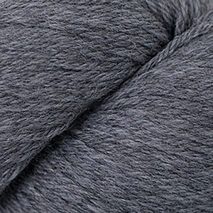 Skein of Cascade 220 Worsted weight yarn in the color Greystone Heather (Gray) for knitting and crocheting.